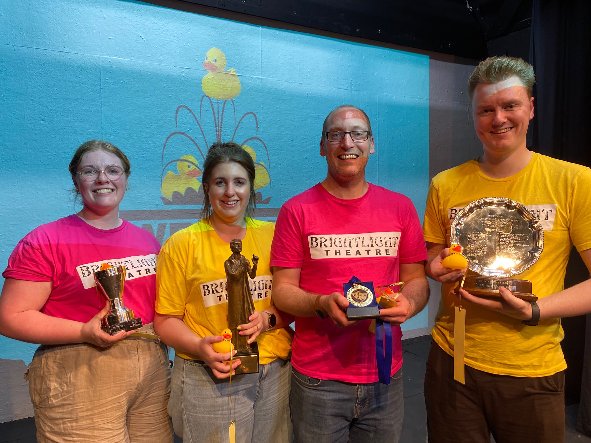 The team collecting their awards at Welwyn Drama Festival.