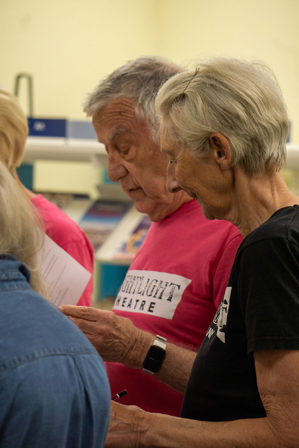 Denise Butcher and Neil Hay, following along with the script.