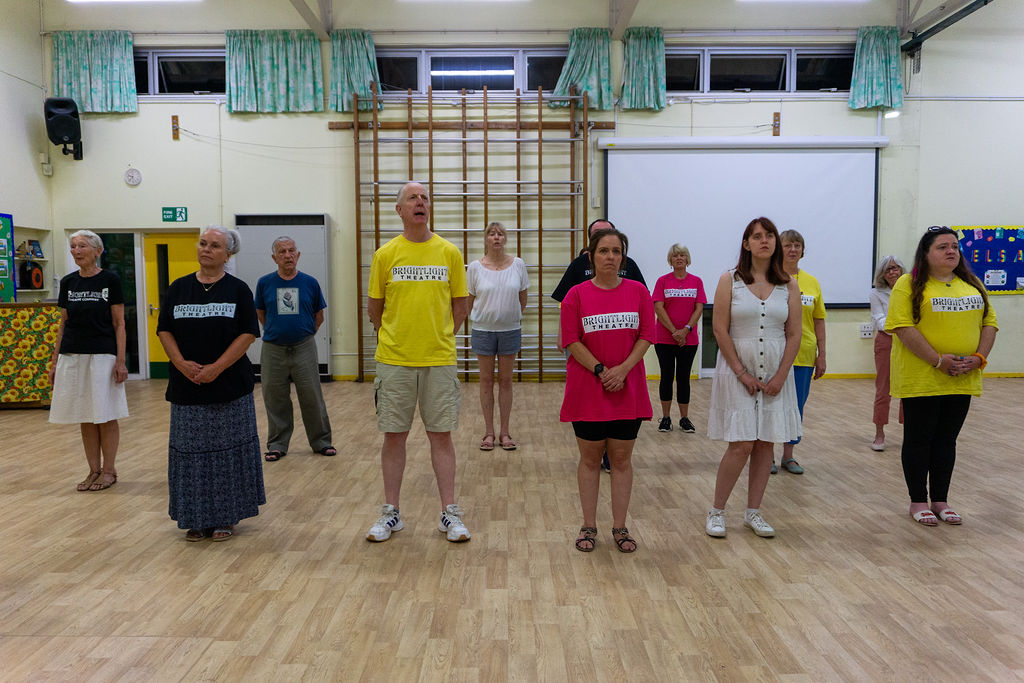 The full cast rehearse the close of Act 1.